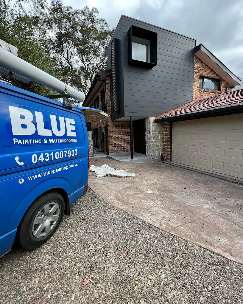 Blue Painting & Decorating company van on a project site in Canberra